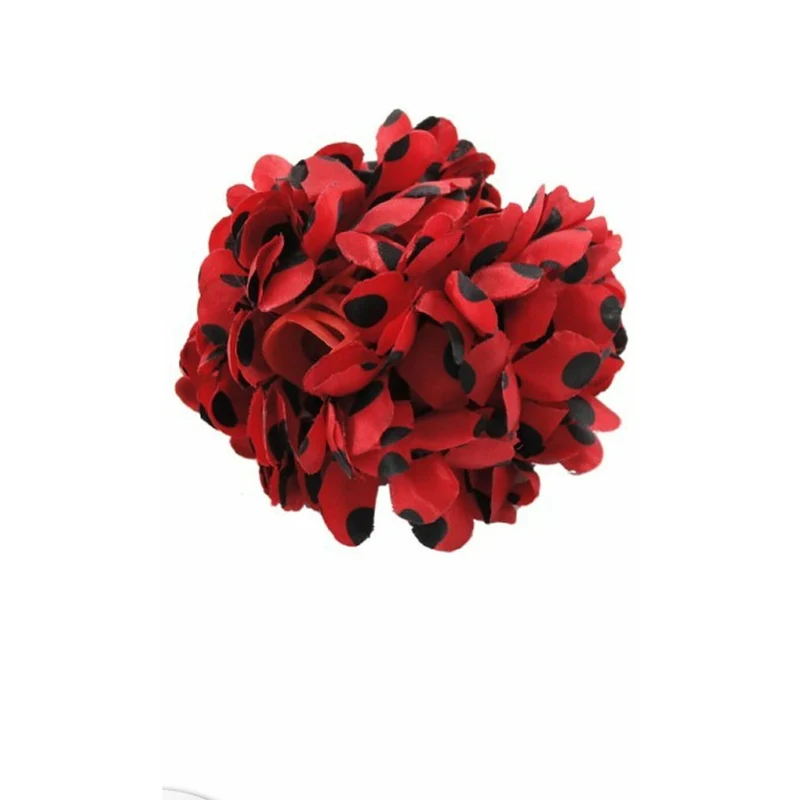 Rote Flamenco-Haarblume mit schwarzen Punkten